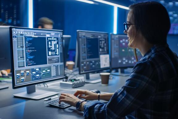 Technology image- worker at desk